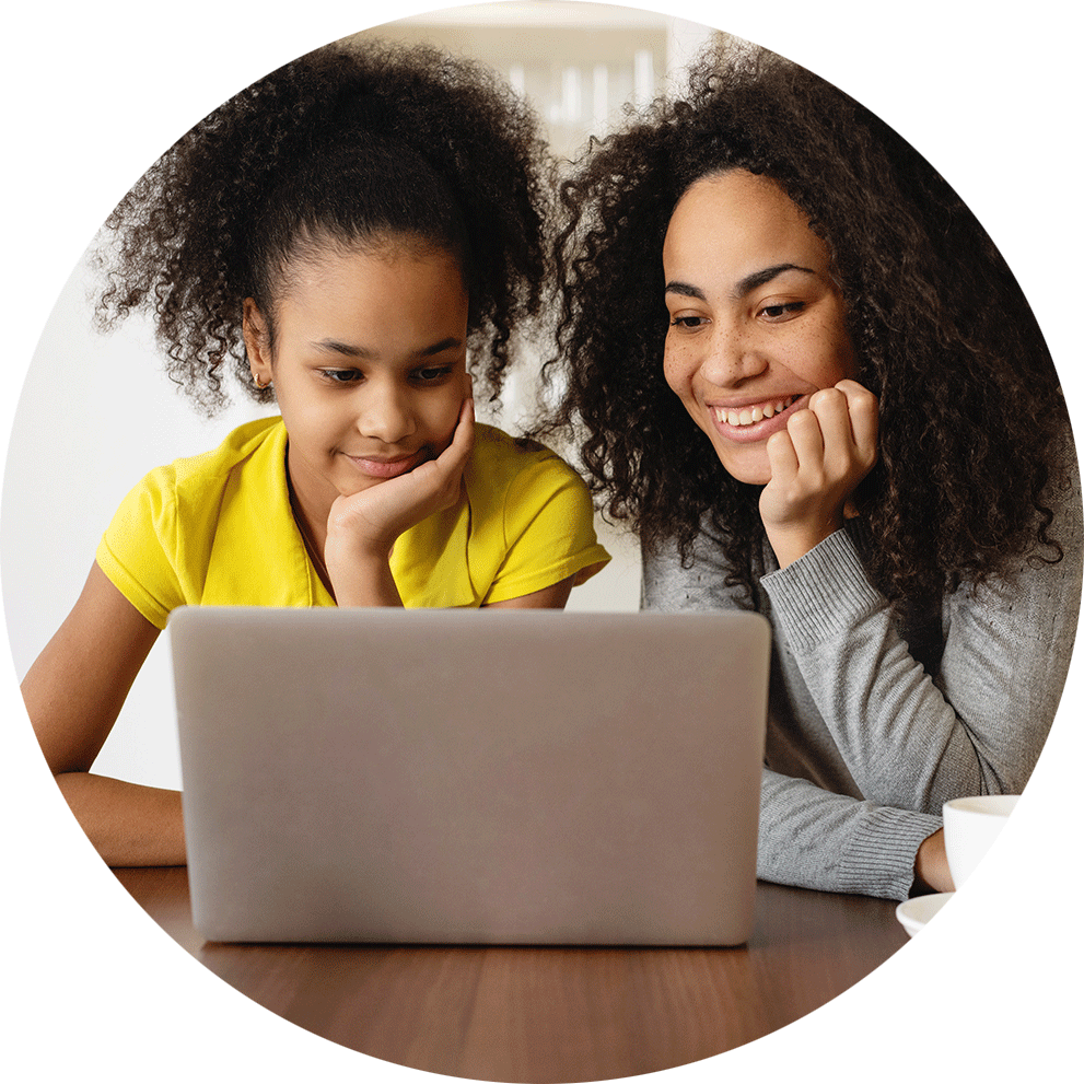 Parent and student reviewing information on a laptop